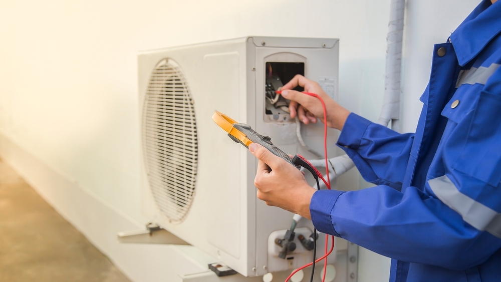 Ac Technician Checking The Operation Of The Air Conditioner System Ac Technician Checking The Operation Of The Air Conditioner System