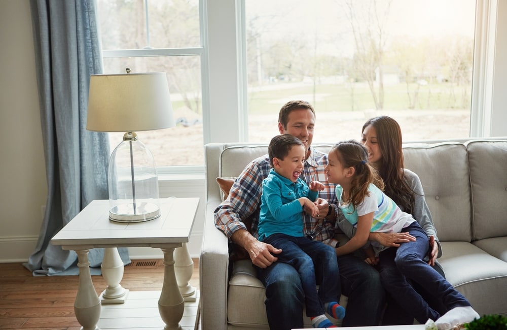 Family enjoying time together in living room.